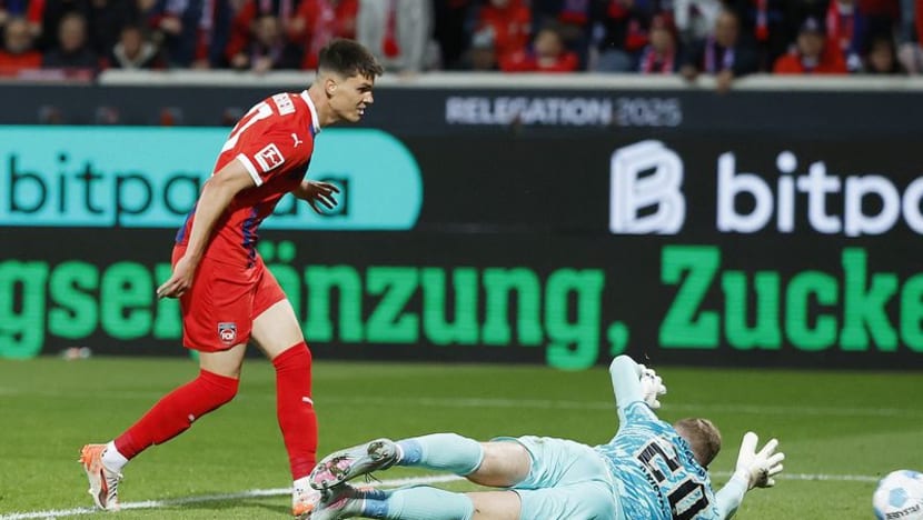 Heidenheim's Dramatic Comeback Secures 2-2 Draw Against Elversberg in Relegation Playoff