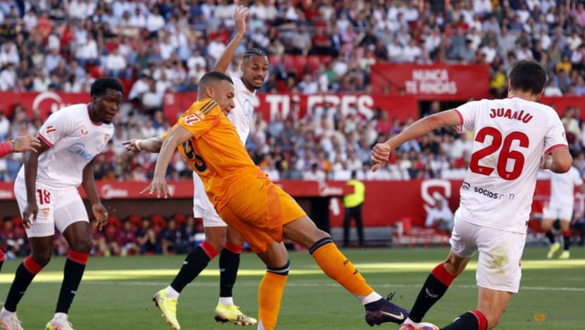 Real Madrid Triumphs 2-0 Against Sevilla Amid Red Cards and Stellar Performances by Mbappe and Bellingham