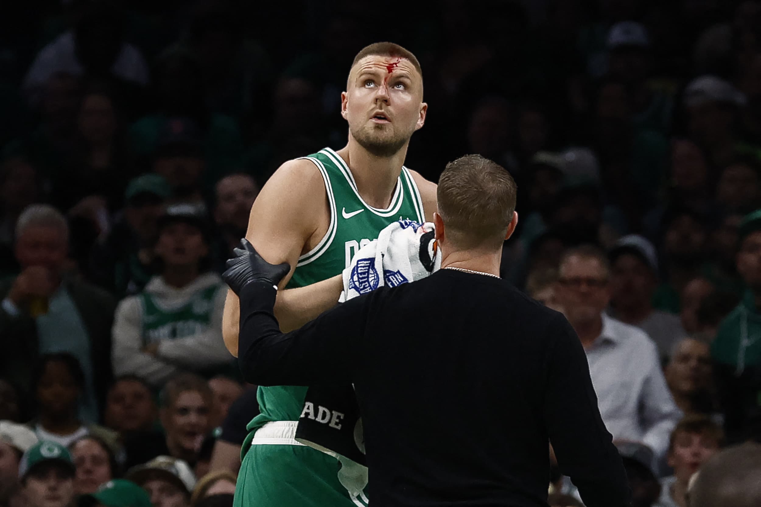 Kristaps Porzingis Bravely Returns After Bloody Elbow Incident in NBA Playoffs