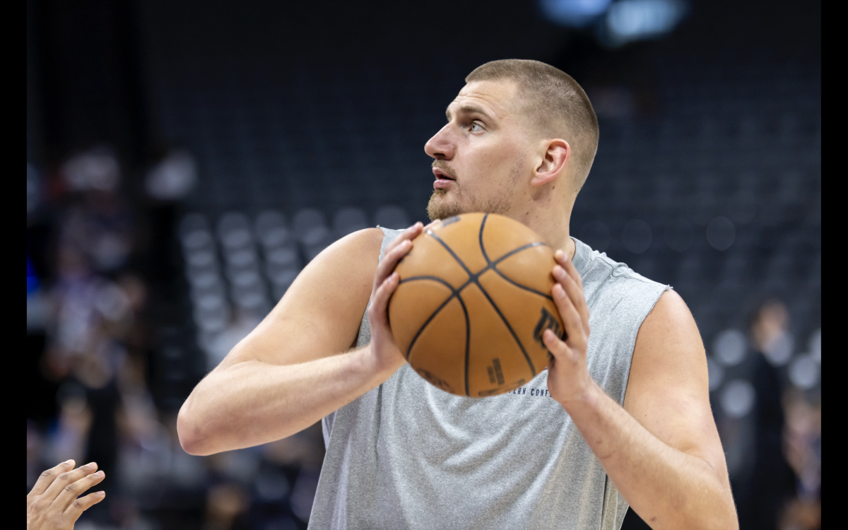 Nikola Jokic's Historic Triple-Double Propels Nuggets to Victory Over Grizzlies