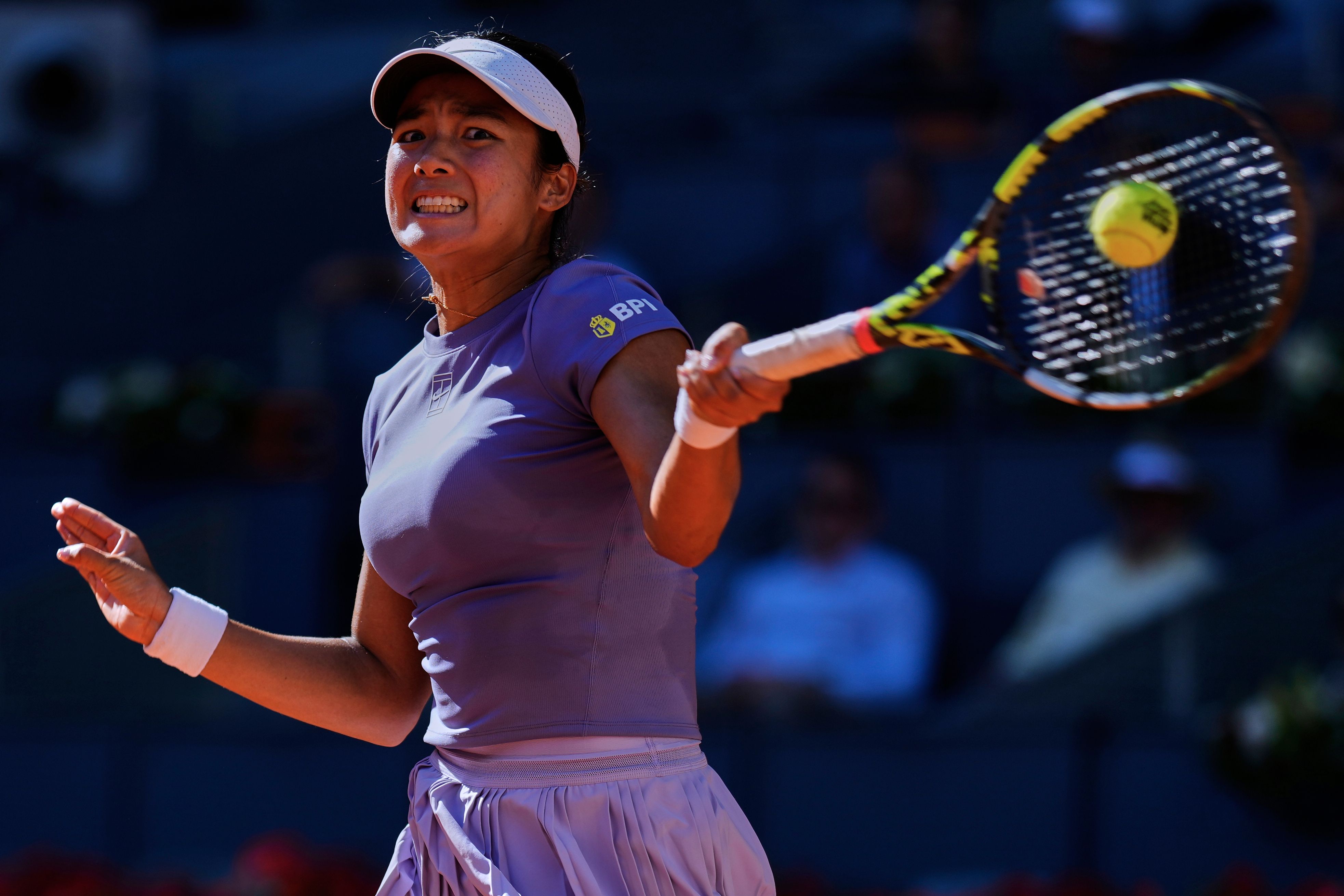 Swiatek Overcomes Early Scare from Eala to Advance in Madrid Open