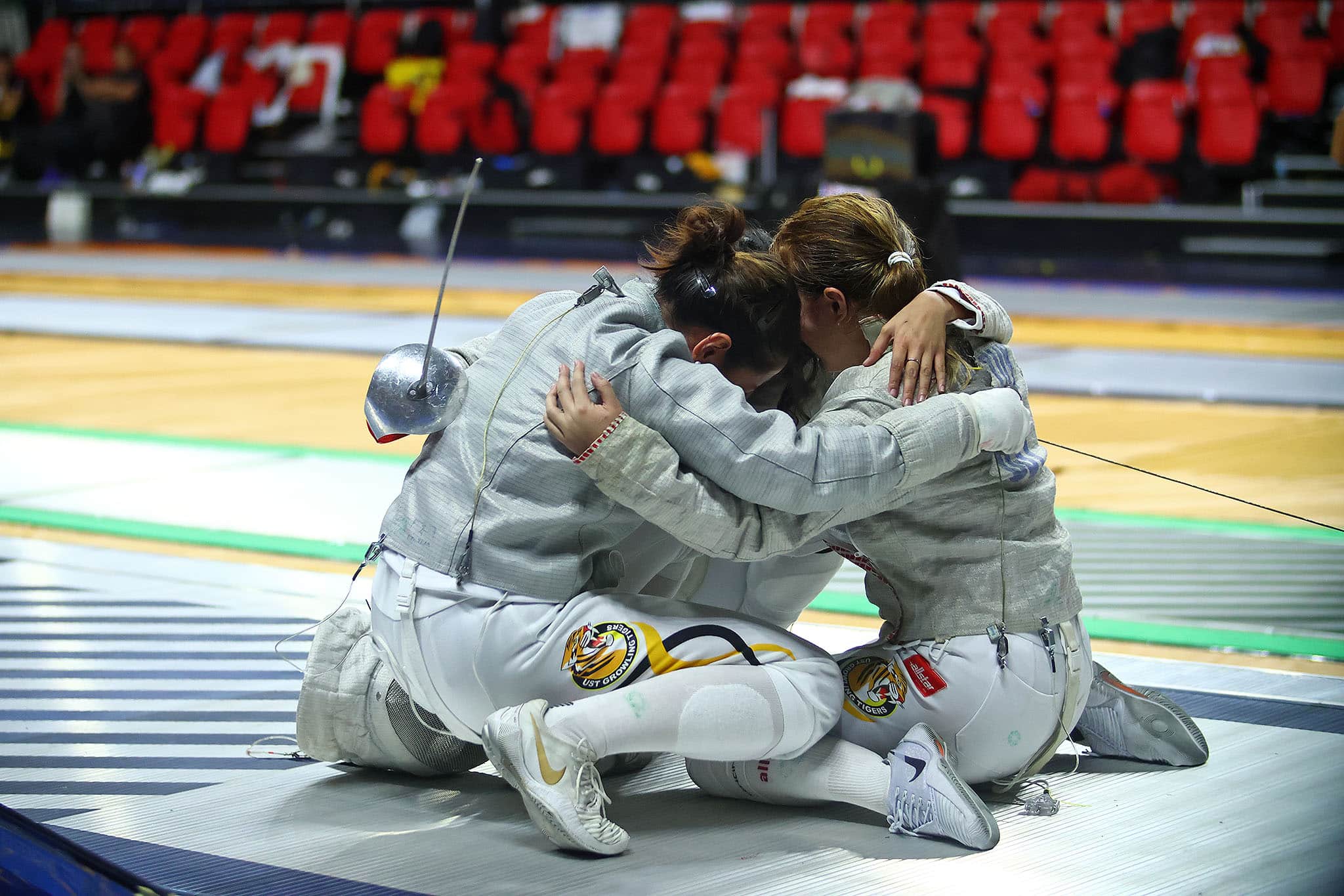 UST Triumphs Over UE in Dramatic UAAP Women's Fencing Championship