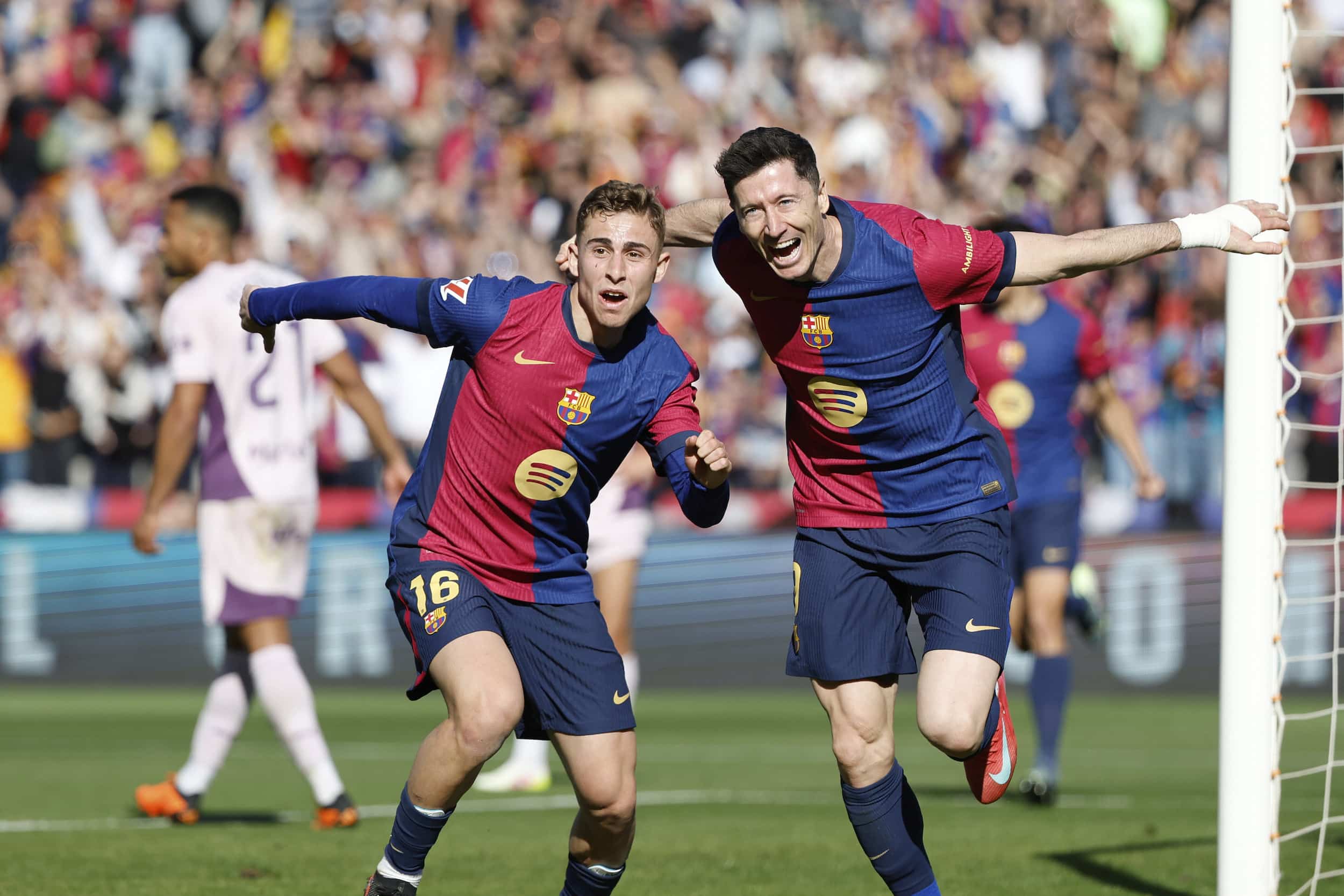 Lewandowski's Brace Propels Barcelona to Maintain Lead Over Real Madrid in La Liga