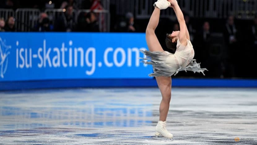 Figure skating-American Liu dazzles in short programme at world championships