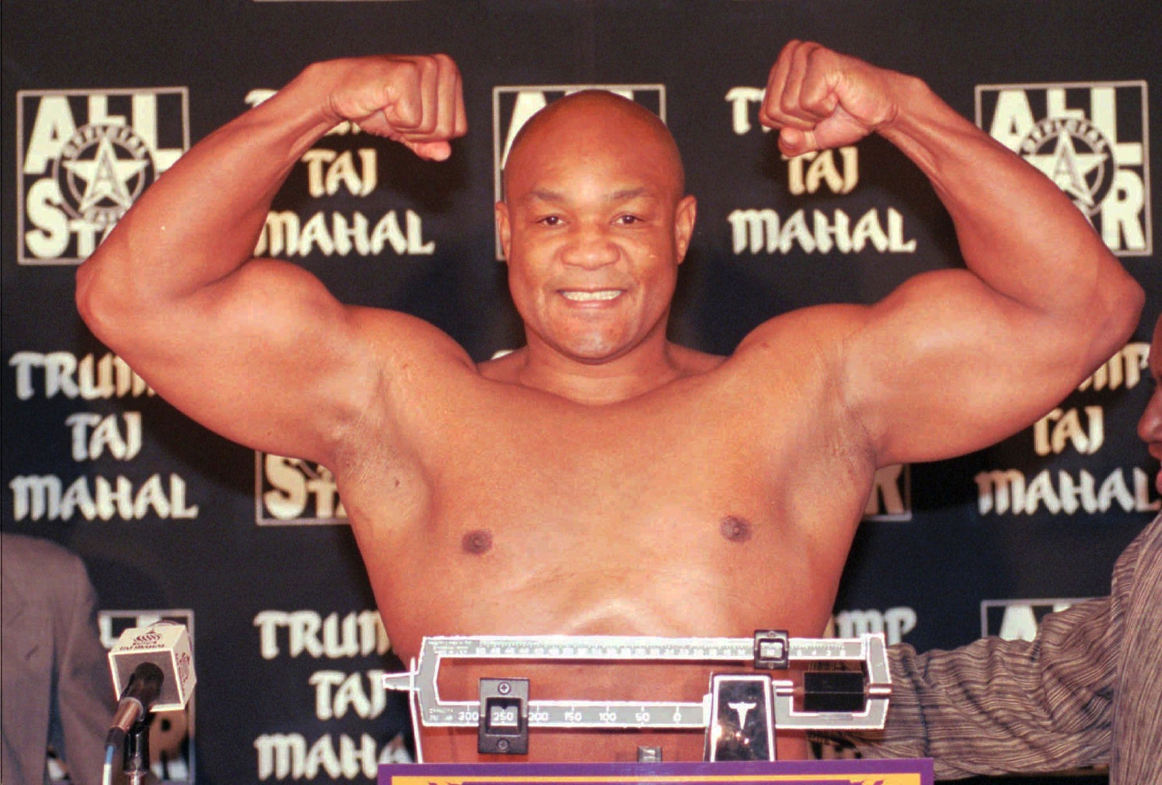 George Foreman, the glowering heavyweight who became a lovable champion, dies at 76