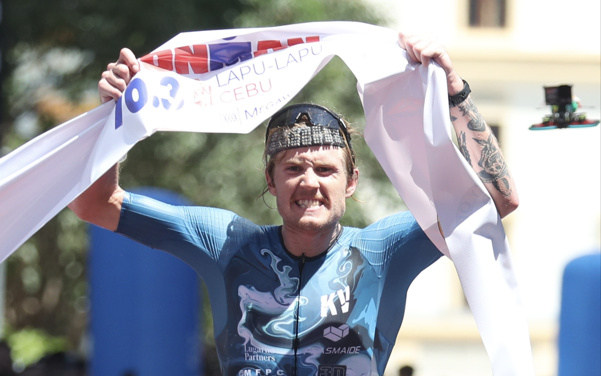 Ferris and Watkinson Celebrate Victory Amidst Cheers at IRONMAN 70.3 Lapu-Lapu