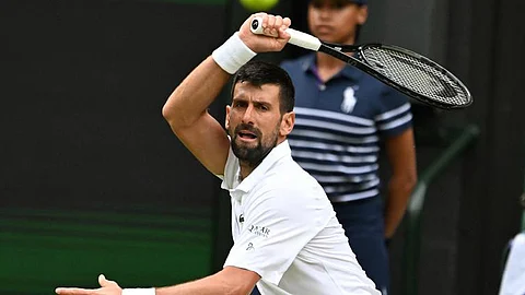 Jannik Sinner Dominates Wimbledon, Advances to Fourth Round Amid Opponent's Struggles