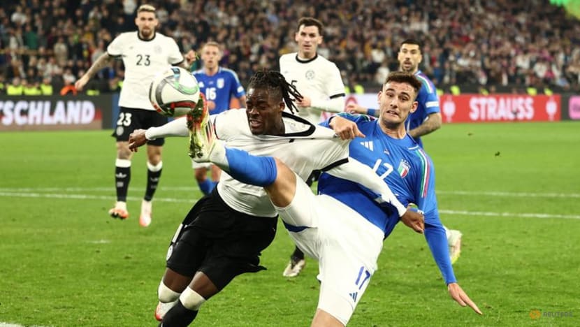 Germany waste three-goal lead but edge past Italy into Nations League semis