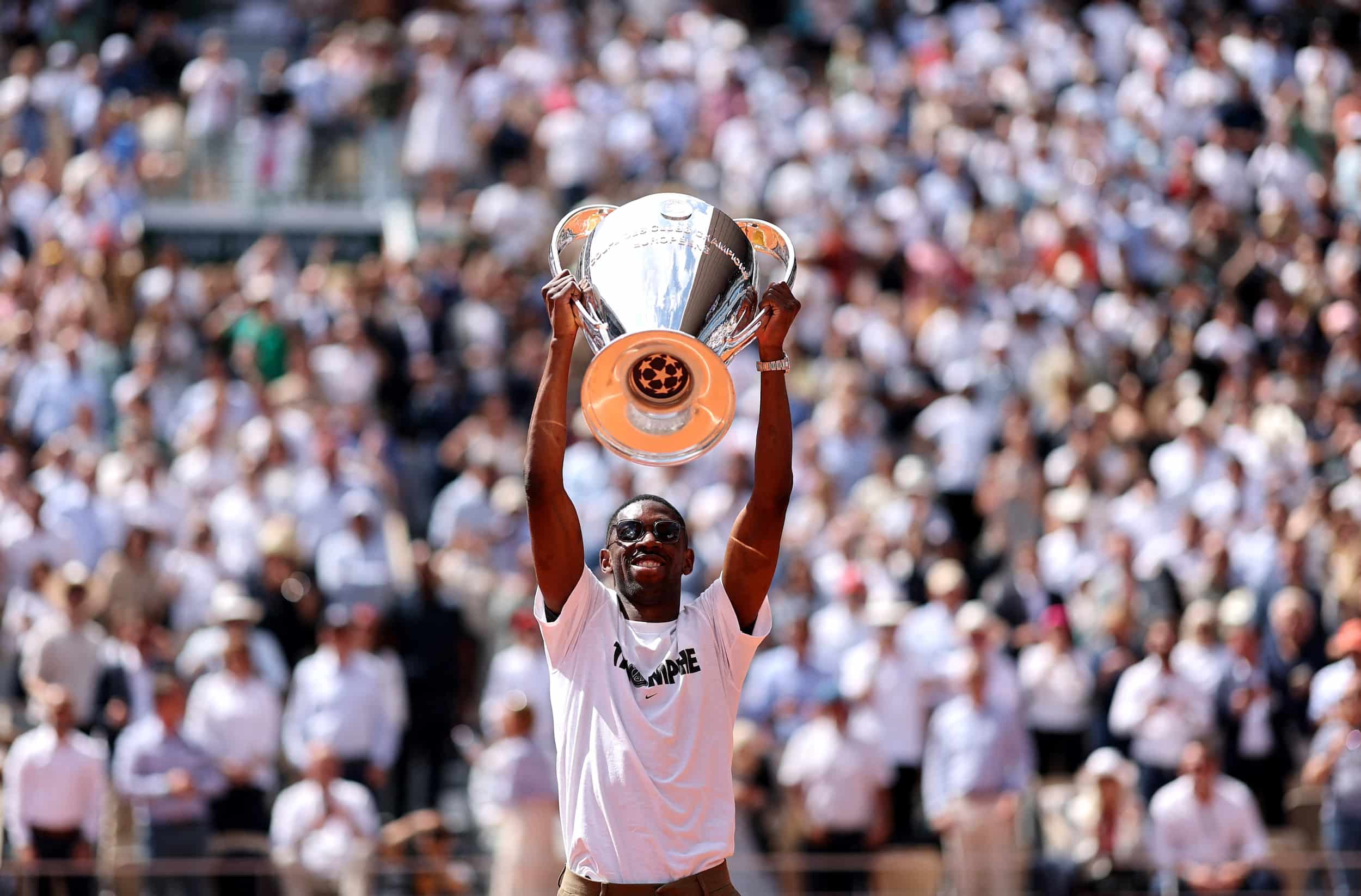 Ousmane Dembele Parades Champions League Trophy at French Open Amidst Roaring Cheers